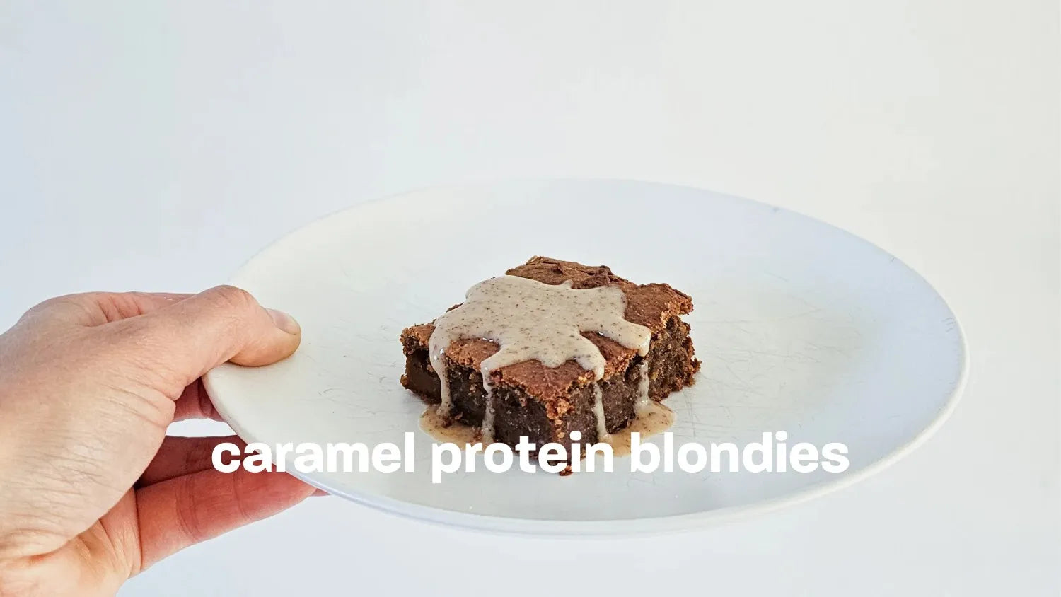 caramel protein blondies with a caramel protein sauce